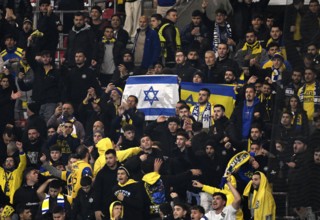 Fan block, fans of Maccabi Tel Aviv FC with Israel flag, national flag, Europa League, MHPArena,