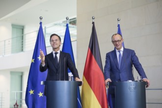 Mark Rutte (Secretary General of NATO) and Friedrich Merz (Chancellor of the Federal Republic of