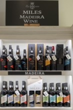 Madeira wine, wine bottles are on shelf, Madeira, Portugal