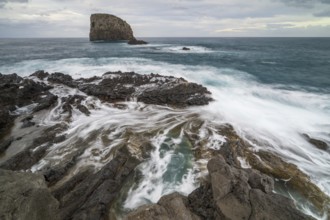 Rocky coast, volcanic rock formations, coast near Porto da Cruz, Madeira, Portugal