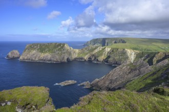 View of blue sea and cliffs with rock gate from Portacloy Loop Cliff Walk, Muingnabo, County Mayo,