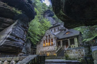 Pension and restaurant The old gas plant at dusk, Hrensko, Czech Republic