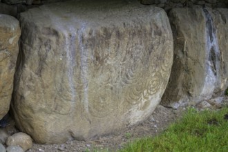 Decorated wall stone at the Knowth megalithic complex, Mellifont, County Meath, Ireland