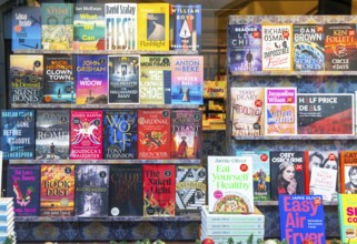 Books in window display of Waterstones bookshop, Ipswich, Suffolk, England, UK