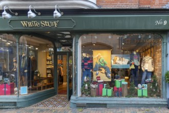 Older woman poster used in window display for White Stuff clothing shop, Ipswich, Suffolk, England,