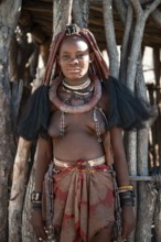 Young woman, Himba woman, traditional Himba village, Kaokoveld, Kunene, Namibia
