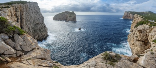 Steep cliffs by the sea and the rocky island of Isola Foradada, Belvedere Foradada, cliffs on the