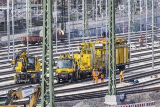 Rail construction crews with a work train. New parking station in Untertürkheim. As part of