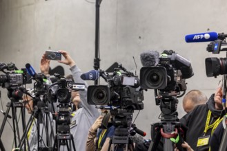 Cameras from various television stations are prepared for a press conference. Stuttgart,