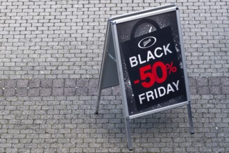 Symbolic photo advertising sign Chicoree Black Friday 50% discount, Lucerne, Switzerland