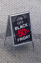 Symbolic photo advertising sign Chicoree Black Friday 50% discount, Lucerne, Switzerland
