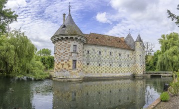 Castle surrounded by a moat in Saint-Germain-de-Livet, Calvados Department, France