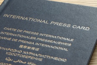 Close-up of an international press pass