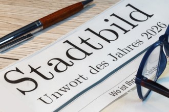 Possible bad word of the year? Symbolic newspaper with the headline CITYSCAPE — UNWORD OF THE YEAR