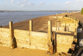 Temporary coastal defences erected by Bawdsey Haven Yacht Club, response to rapid erosion beach
