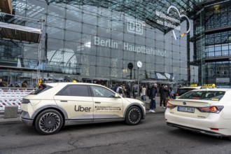 Uber taxi in front of the main train station in Berlin, waiting in line for passengers, Germany