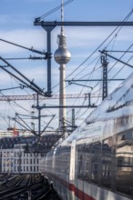 Railway line in Berlin, east of Friedrichstraße station, looking east, Berlin TV tower, ICE train