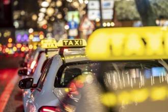 Taxi stop, on Tauentzienstraße in Berlin, in the evening, Germany