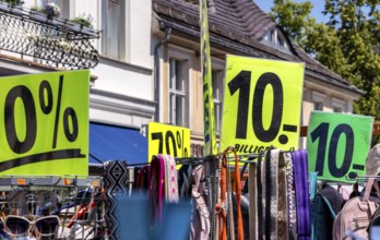Retail trade with signs for price reductions and discounts, Potsdam, Brandenburg, Germany