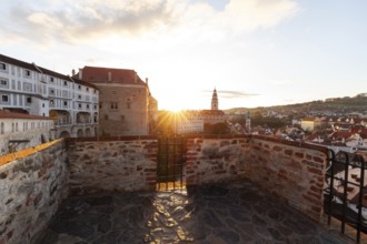 Spring morning sunrise with castle view over the rooftops of Krumlov in southern Bohemia, Czech