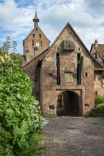 The entrance portal on the city wall of the historic town of Riquewihr, Ellsass