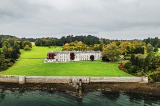 Autumn over Plas Newydd House from a drone, Gardens and Parkland, Llanfairpwllgwyngyll, Anglesey,