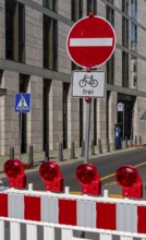 Barriers and signs with traffic signs at road construction sites in Berlin Mitte, Berlin, Germany