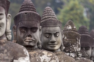 54 demons on the bridge at the south gate of Angkor Thom (Hindu myth of the Cherry of the Milk
