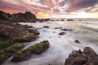 Sunset at Fisherman's Lookout. Dramatic waves and coastal scenery at The Pass, New South Wales,