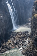 Water plunges into the depths, Victoria Falls with gorge, Zambezi, Zimbabwe