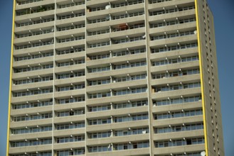 High-rise apartment building with balconies and satellite dishes, satellite town of Chorweiler in