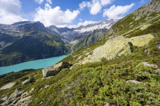 Turquoise blue mountain lake Göscheneralpsee, picturesque mountain landscape with dammastock and