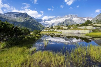 Picturesque mountain landscape, dammastock and damma glaciers reflected in Moorsee, Göscheneralp,