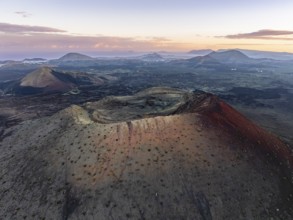 Caldera Colorada volcano, picturesque volcanic landscape with volcanic crater at sunrise, Parque