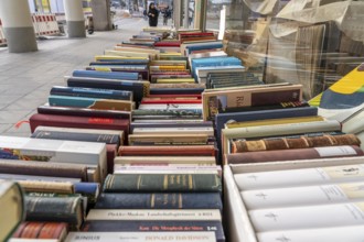 Table with partly old books, offered by a second-hand bookshop