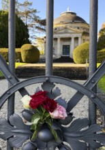 Roses at the fence door of the Carstanjen mausoleum in the Plittersdorf district, Bonn, North