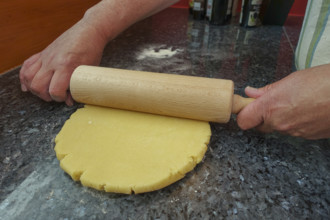 Southern German cuisine, preparation of shortcrust pastry, raw dough on the worktop, waving dough,
