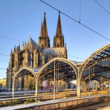 Central station with platform roof and cathedral early in the morning, Cologne, Rhineland, North