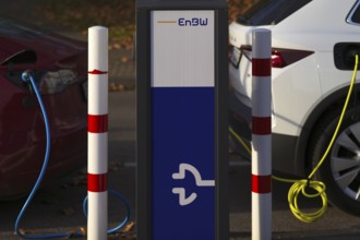 Parking lot with gas pump, EnBW charging station for electric cars, charging station, e-charging