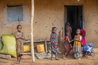 Villagers in a traditional village, mud huts, Sadaani, Tanzania