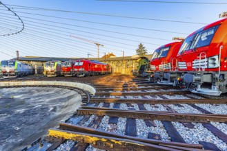 Modern locomotives of the Austrian Federal Railways, ÖBB, and Deutsche Bahn, DB, parked in front of