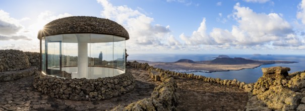 Stairway and viewing platform at the Mirador del Río viewpoint, in the evening light with sun