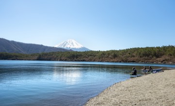 Anglers at Lake Saiko, behind volcano Mt. Fuji, Minamitsuru District, Yamanashi Prefecture, Japan