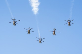 Indian Air Force aerobatic team performs during rehearsals ahead of the air show organised as part