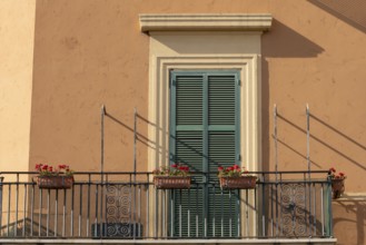 Window of a building in the city of Rome, Italy