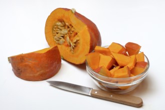 Hokkaido pumpkin, sliced with a knife