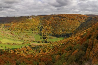 Indian summer on the Swabian Jura in the Nenninger Valley with the ruins of Reussenstein Castle