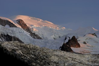 Snow-covered Mont-Blanc in the light of the setting sun, Chamonix-Mont-Blanc, Haute-Savoie, France