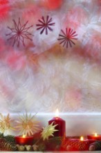 Christmassy decorated iced window, candle light, straw stars, Germany