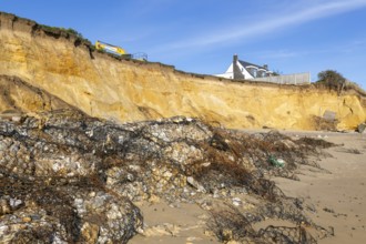 Clifftop houses at risk from coastal erosion, Thorpeness, Suffolk, North Sea coast, England, UK